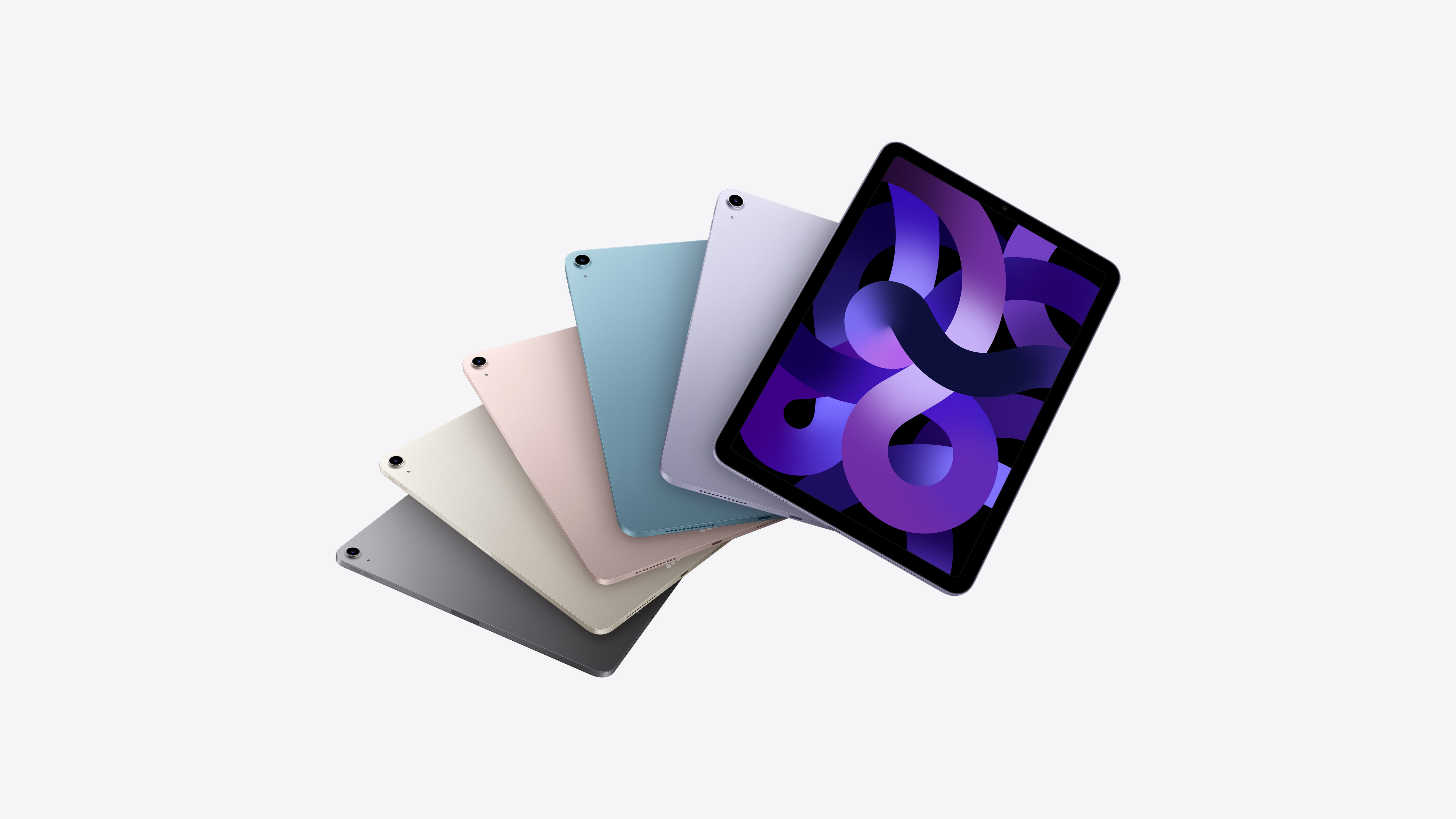 iPad Air 正面的側看角度，其後方還有五部 iPad Air 排列成扇形，均為可供選擇的顏色。